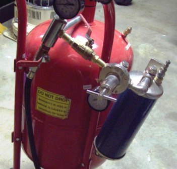 A 40 pound pressure pot sandblaster.