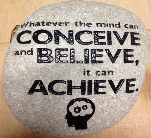 A garden rock sandblast engraved with quotes.