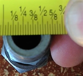 Measurement of 3/8" NPT fitting.