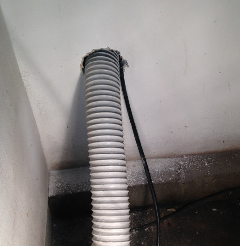 hose and wire through wall
